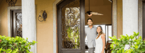 home owners outside their home