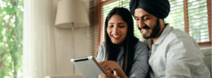 happy Indian couple browsing together